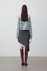 Bow-detailed washed blue denim jacket