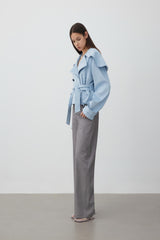 Wide-lapel blue suede tie-waist cropped trench coat