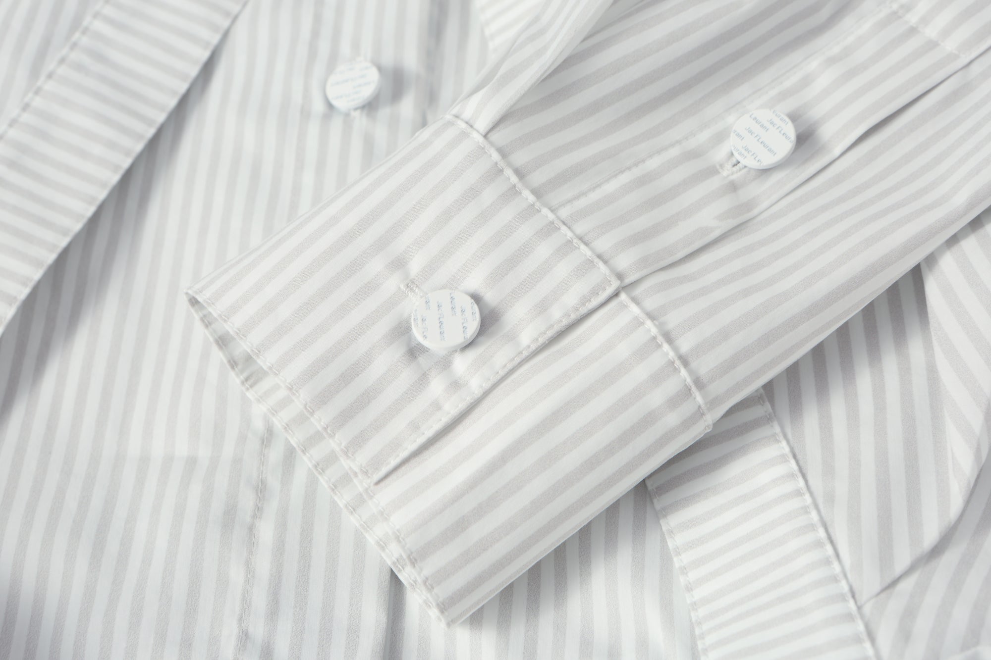 Two-piece striped tie-front shirt with denim patchwork pleated shorts