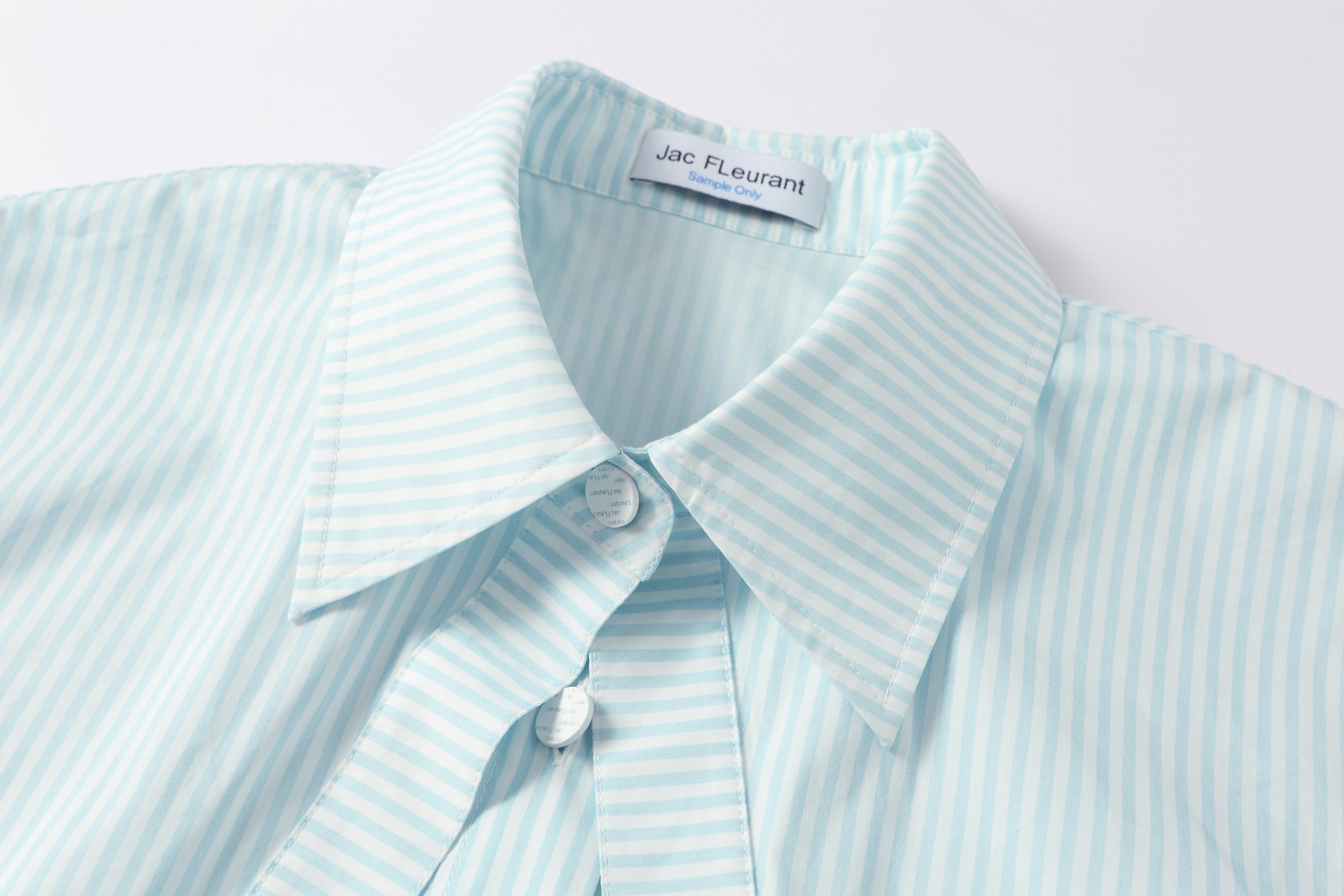 Two-piece striped tie-front shirt with denim patchwork pleated shorts