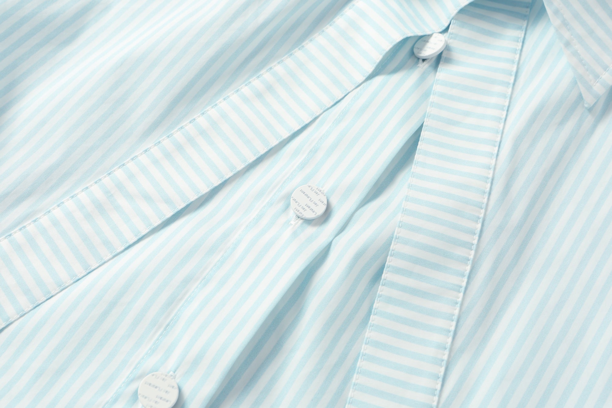 Two-piece striped tie-front shirt with denim patchwork pleated shorts