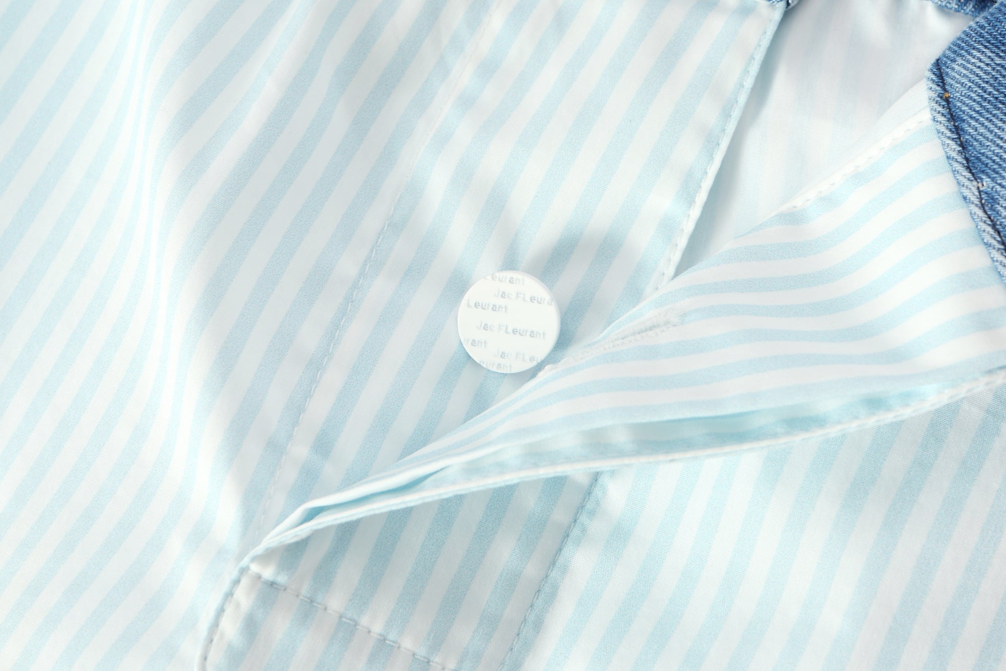 Two-piece striped tie-front shirt with denim patchwork pleated shorts