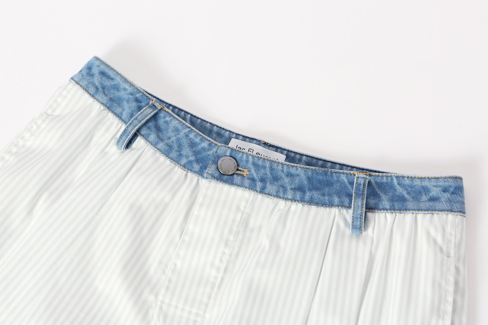 Two-piece striped tie-front shirt with denim patchwork pleated shorts